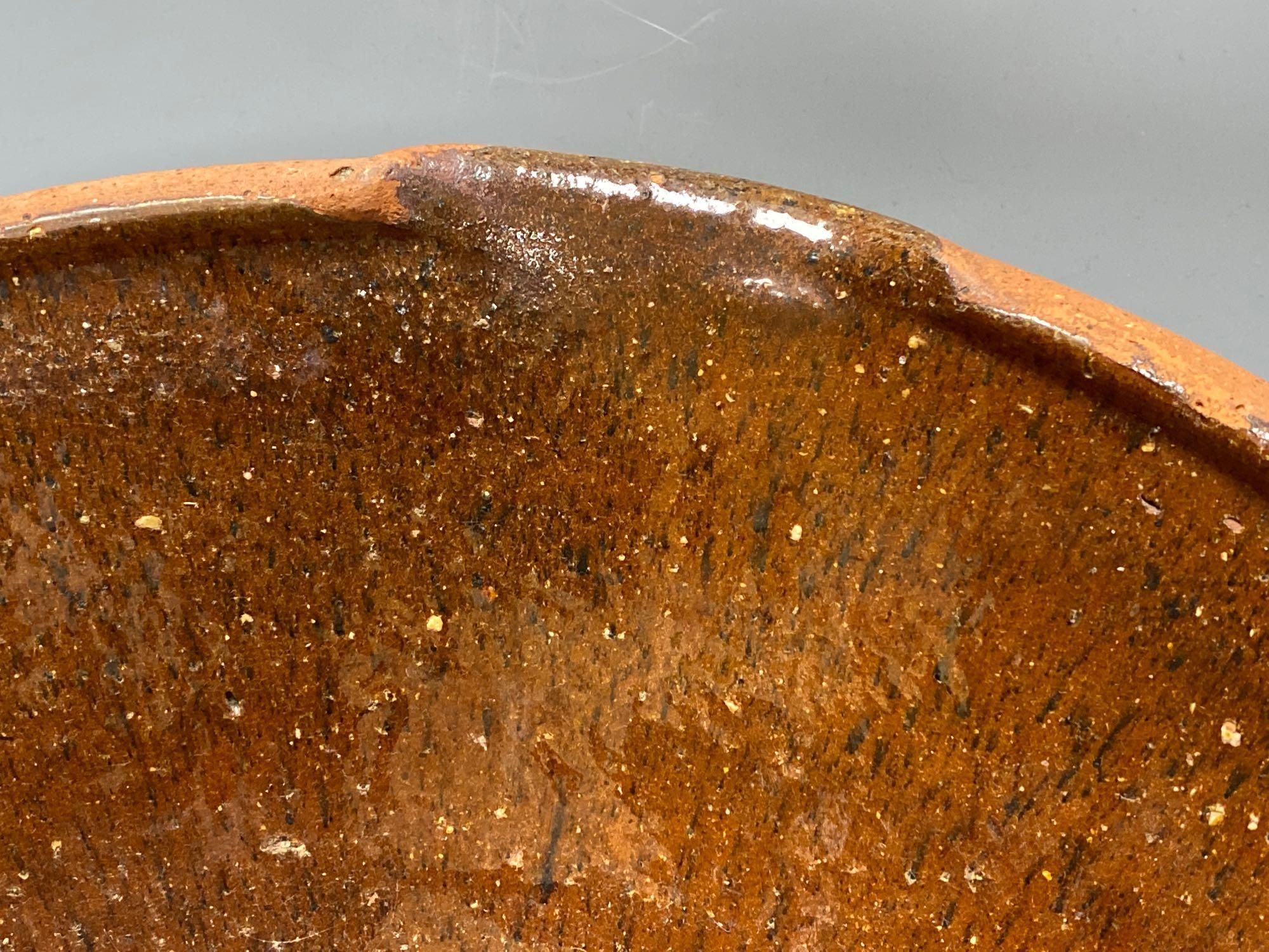 A 19th century Sussex terracotta basin